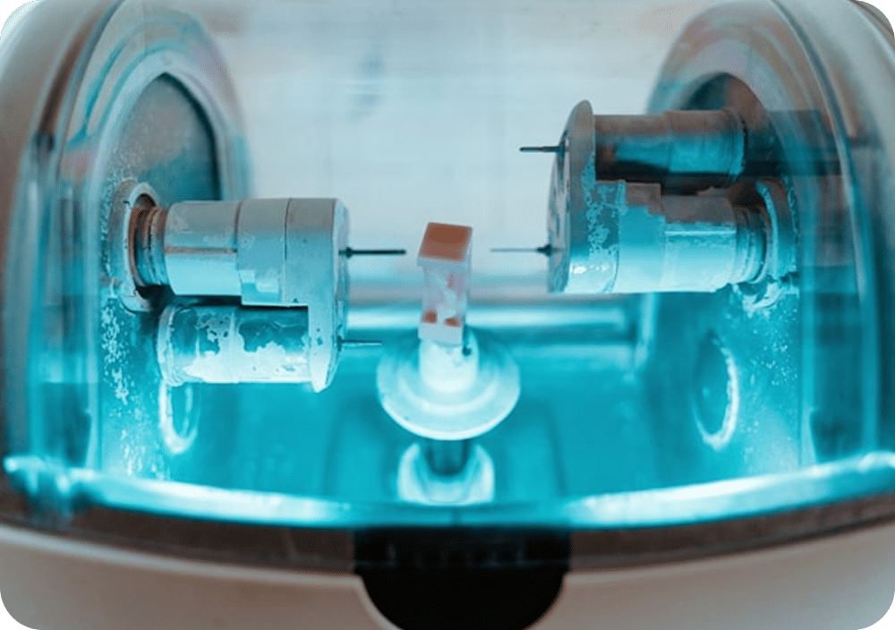 5-axis dental milling machine milling a restoration